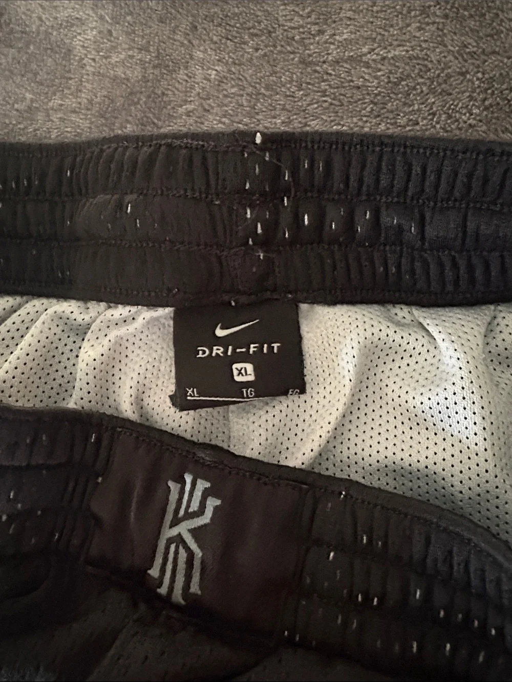 Nike Black Kids Mesh Shorts with Bright Blue Logo